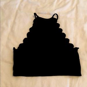 Black crop top. Nylon. Sturdy material